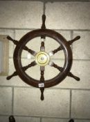 A small ship's wheel.