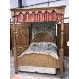 A pine 4 poster bed (mattress not included)