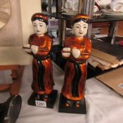 2 Asian pottery figures of flute players.