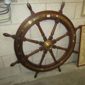 A 94 cm diameter ship's wheel.