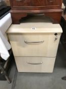 A lightwood effect 2 drawer filing cabinet