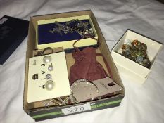 A mixed lot of costume jewellery including earrings, bracelets, pendants etc.