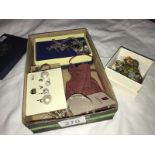 A mixed lot of costume jewellery including earrings, bracelets, pendants etc.