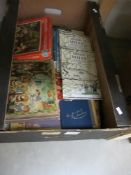 A box of ephemera, primarily to do with Swallows and Amazons, vintage picture puzzle,