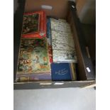 A box of ephemera, primarily to do with Swallows and Amazons, vintage picture puzzle,