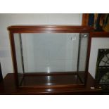 A large mahogany framed display cabinet