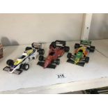 3 Burago model F1 racing cars