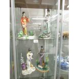 4 manabu Saito Malaysian porcelain figurines, a/f.