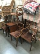 An Edwardian mahogany drop leaf dining table