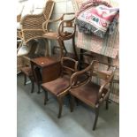 An Edwardian mahogany drop leaf dining table