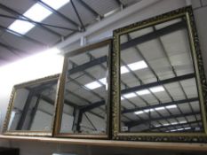 A pair of gilt framed mirrors and a gilt framed bevel edged mirror