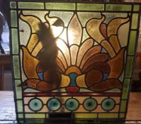 2 leaded stained glass panels featuring bottle ends, approximately 22.5 x 22.5".