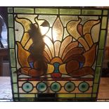 2 leaded stained glass panels featuring bottle ends, approximately 22.5 x 22.5".