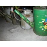 6 old metal watering cans