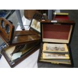 A Victorian stereoscope viewer with 120 cards in box with bone label 'The Stereoscopic Treasury'.