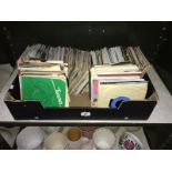 A quantity of 45 RPM records including Beatles, Stones etc.