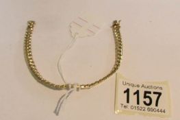 A 9ct gold bracelet marked 375, KT9, Italy, approximately 13 grams.