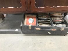 A large case of 45's (records) including Queen, David Bowie, Clash, styx,alice cooper, nazareth,