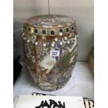 An oriental pottery barrel stool/plant stand