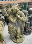 A stone staue of 2 lovers