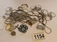 A mixed lot of silver jewellery including rings (missing stones).