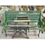 A vintage cast iron garden bench and 2 pair of table ends
