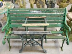 A vintage cast iron garden bench and 2 pair of table ends