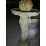 A decorative bird bath