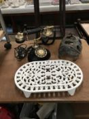 An old telephone, cast iron pan holder etc.