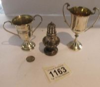 2 silver goblets and a silver pepper pot, approximately 70 grams.