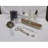 A mixed lot including perfume bottles (some with silver tops), silver photo frame etc.