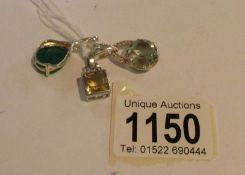3 silver pendants set with citrine, verde onyx and prasiolite.