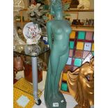 A French art deco figure of a lady (some damage to head).