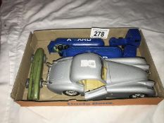 A tinplate streamline racing car, Burago Jaguar XK120 etc.