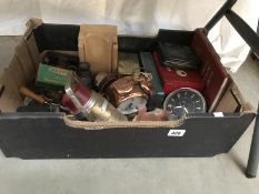 A mixed lot of coins, camera, tins etc.