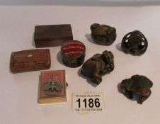 4 wooden netsuke and 4 snuff boxes.