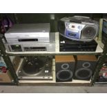 A pair of Ferguson speakers, dvd player, VHS player, cassette deck etc.
