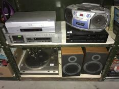 A pair of Ferguson speakers, dvd player, VHS player, cassette deck etc.