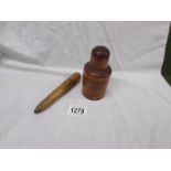 A Victorian medicine bottle in wood case and a syringe in wood case.