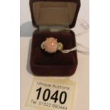 A pink stone set ring in 9ct gold, size S.