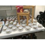 Large quantity of Nescafe mugs and cups and saucers,