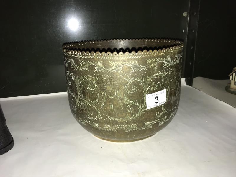 A brass planter