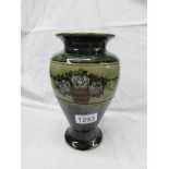 A Royal Doulton stoneware vase.