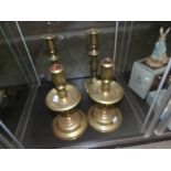 2 pairs of Victorian brass candlesticks.