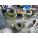 3 stone urns,