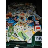 A tray of assorted trade cards including Jacob's picture cards, Anglo American chewing gum,