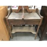 An Edwardian oak washstand