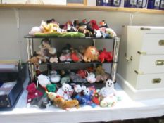 A large collection of Ty beanie babies including bears