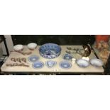 An Oriental dish, rice bowls, spoons,