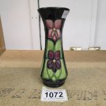 A Moorcroft stylish violets 364/5 Sally Tuffin vase.